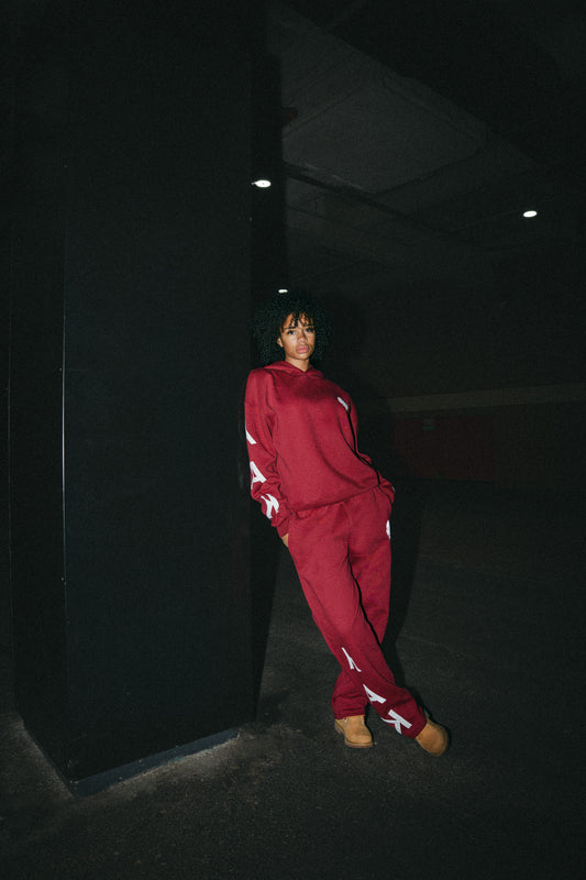 Y.A.K unisex burgundy red tracksuit with white puff print logo