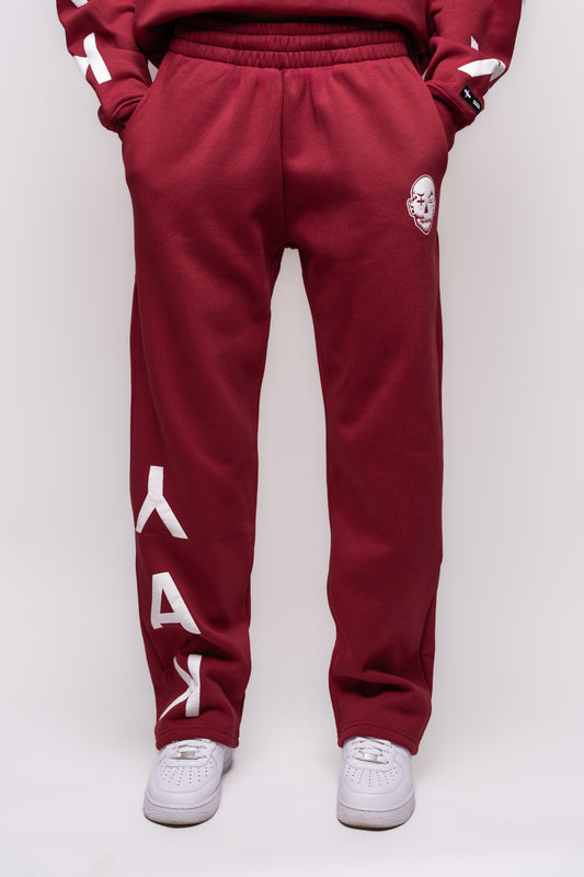 yak burgundy straight leg jogger with white bubble print logo details