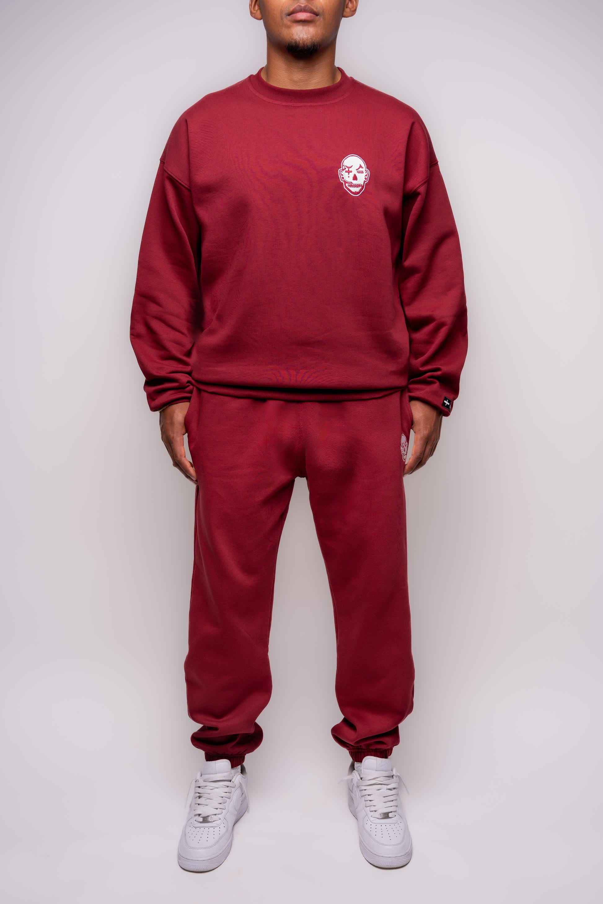 yak burgundy tracksuit with white embroidery details