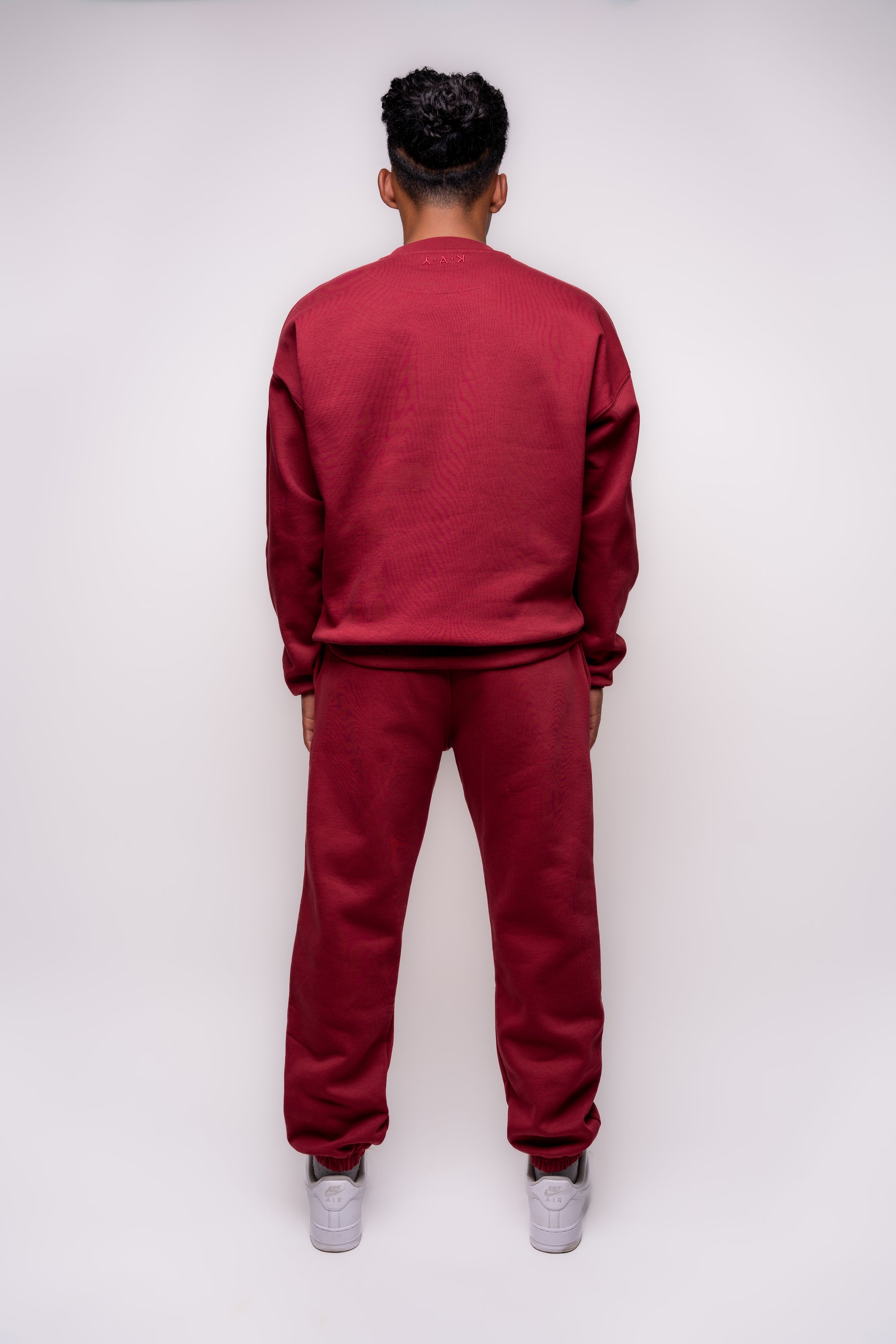 burgundy yak tracksuit with clean embroidery details 