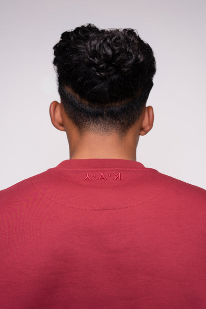 burgundy red tracksuit with embroidery details 