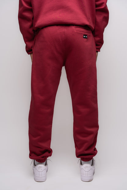 yak burgundy jogger with embroidery details on the back pocket