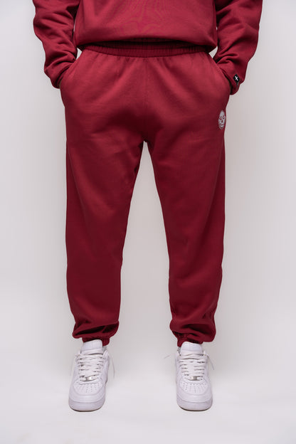 yak burgundy jogger with white embroidery details 